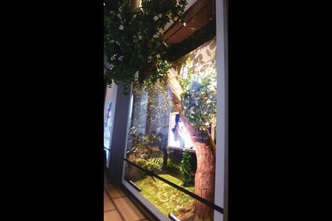 Shoppers wandering past this store are presented with windows that reach beyond the glass and out into the street that faces the city’s cathedral